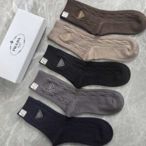 Brand new PRADA luxury boxed socks, made of wool, 5 pairs per box.